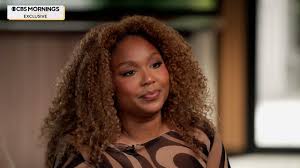 Lizzo says new album is coming as legal fight continues