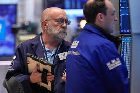 Oil slides, stocks climb on hopes for U.S.-Iran deal