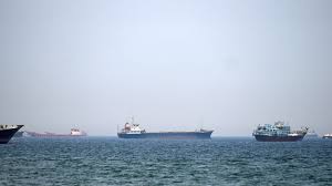 Trump says US will guide stranded ships out of Hormuz as Iran warns against intervention